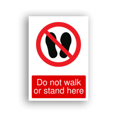 Do Not Walk or Stand Here prohibition sign safety sign with two black footprint silhouettes inside a red prohibition circle with a diagonal red bar across them.