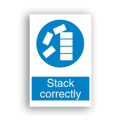 Stack Correctly mandatory sign safety sign with white rectangular blocks shown in two states: arranged in a neat, aligned vertical stack on the right, and scattered haphazardly on the left, within a blue mandatory-action circle.