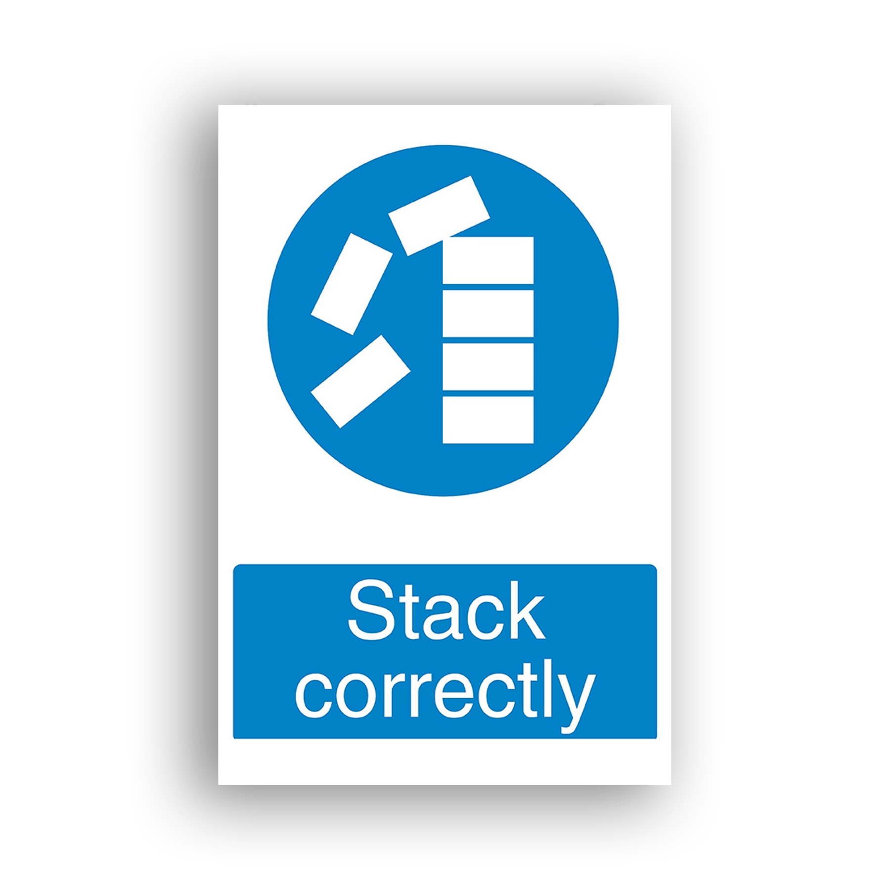 Stack Correctly mandatory sign safety sign with white rectangular blocks shown in two states: arranged in a neat, aligned vertical stack on the right, and scattered haphazardly on the left, within a blue mandatory-action circle.