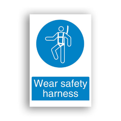 Wear Safety Harness mandatory sign safety sign with white pictogram of a person wearing a full-body safety harness with an attached lanyard, set within a solid blue circle.